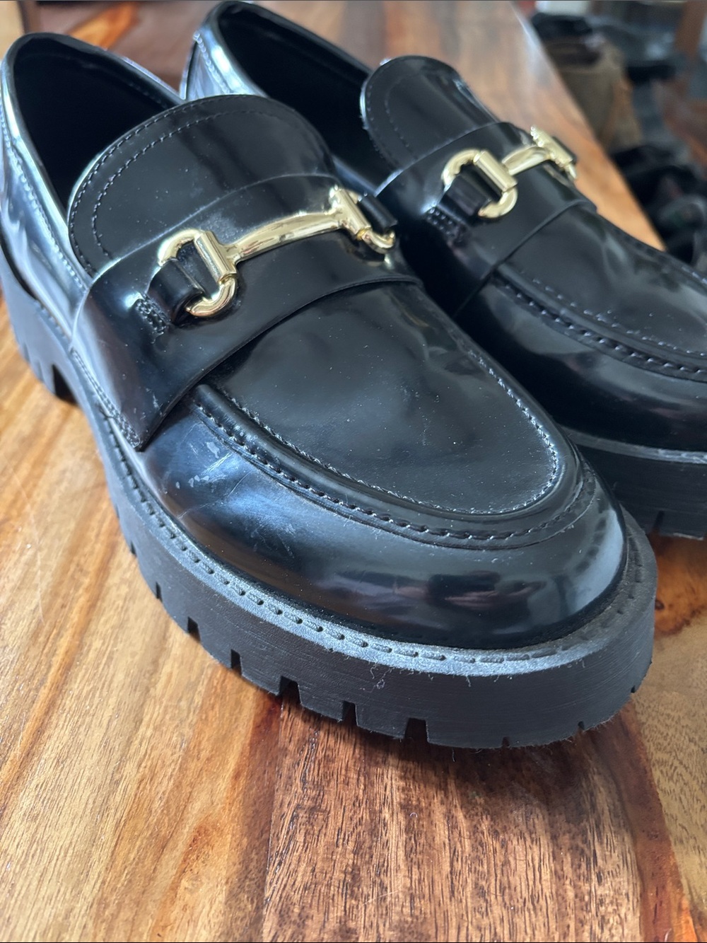 Women’s  Black Leather Lug-Soled Bit Loafers